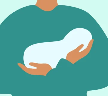 نوزاد در آغوش پدر